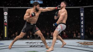 MMA fighters exchanging strikes inside the UFC octagon ahead of UFC 329