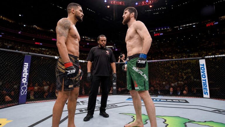 Two fighters facing off in the octagon before UFC 329 McGregor vs Holloway 2