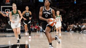 Jackie Young driving to the basket for the Las Vegas Aces