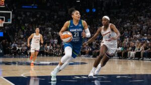 Kayla McBride driving to the basket for the Minnesota Lynx at Target Center