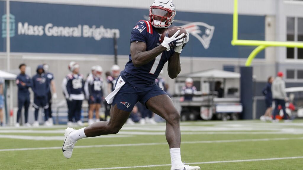 A.J. Brown catching a pass in New England Patriots uniform during practice