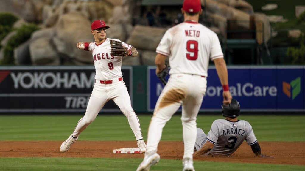 Zach Neto turning a double play at shortstop for the Los Angeles Angels