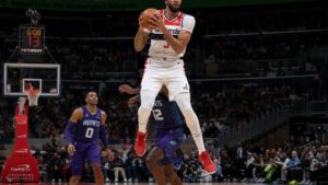Anthony Davis grabbing a rebound in action for the Washington Wizards