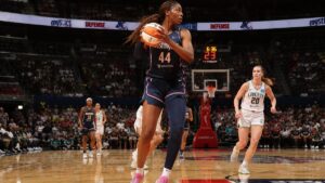 Kiki Iriafen grabbing a rebound for the Washington Mystics against the Atlanta Dream