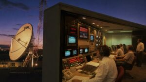 Vintage satellite broadcast studio evoking the 1979 launch of ESPN, the 24-hour sports network founded by Bill Rasmussen