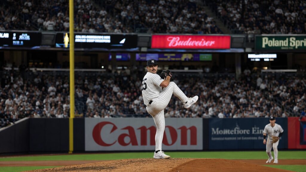 Carlos Rodon pitching for the New York Yankees at Yankee Stadium