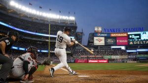 Ryan McMahon batting for the New York Yankees against the Atlanta Braves