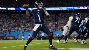 Cam Ward throwing a pass for the Tennessee Titans during preseason
