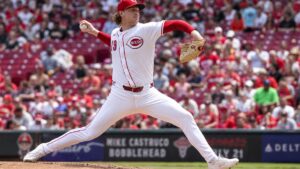Brady Singer pitching for the Cincinnati Reds against the St. Louis Cardinals