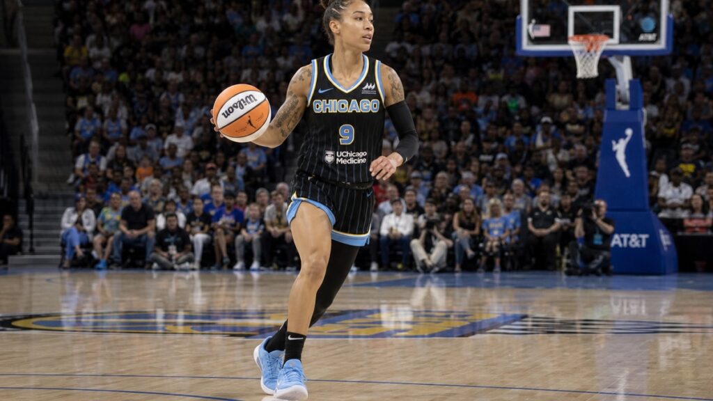 Natasha Cloud brings the ball up the court for the Chicago Sky