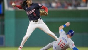CJ Abrams turning a double play at shortstop for the Washington Nationals