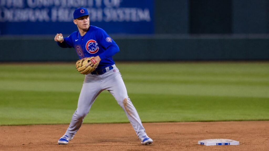 Nico Hoerner fielding at second base for the Chicago Cubs at Kauffman Stadium