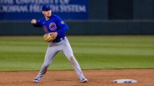 Nico Hoerner fielding at second base for the Chicago Cubs at Kauffman Stadium
