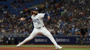 Freddy Peralta pitching for the Tampa Bay Rays after his trade from the New York Mets