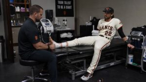 San Francisco Giants outfielder with injured left foot receiving treatment in team facility
