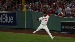 Wilyer Abreu making a running catch in right field for the Boston Red Sox at Fenway Park