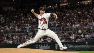 Grant Holmes pitching for the Atlanta Braves against the Arizona Diamondbacks