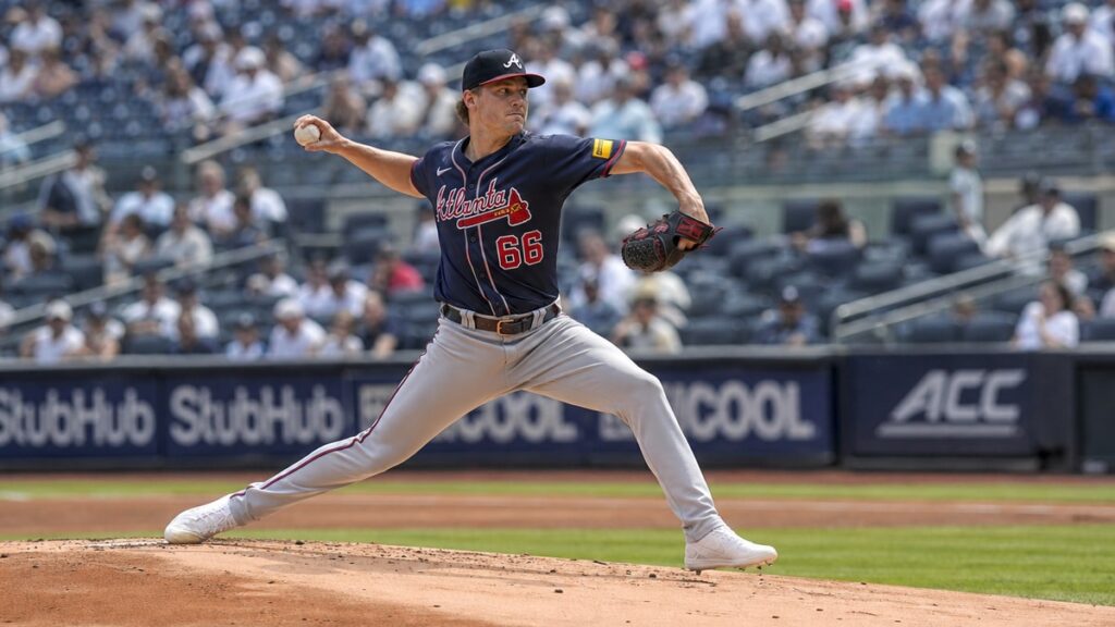 Grant Holmes pitching for the Atlanta Braves against the New York Yankees