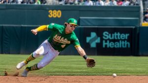 Jacob Wilson fielding a ground ball at shortstop for the Oakland Athletics