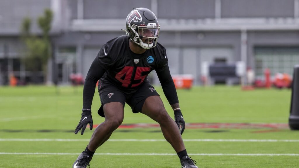 Jalon Walker practicing as an edge rusher for the Atlanta Falcons before his season-ending ACL injury