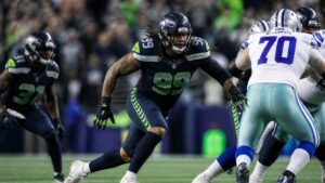 Leonard Williams pressuring the quarterback in a Seattle Seahawks jersey