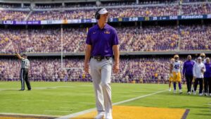 LSU head coach Lane Kiffin on the sideline at Tiger Stadium