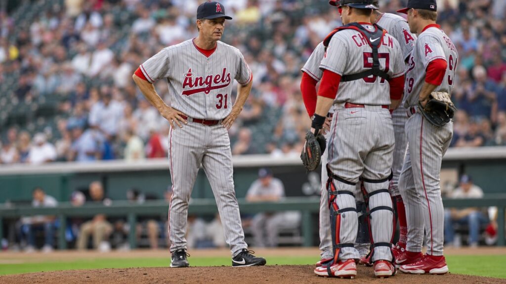 Mike Maddux on the pitching mound as Angels pitching coach before his firing
