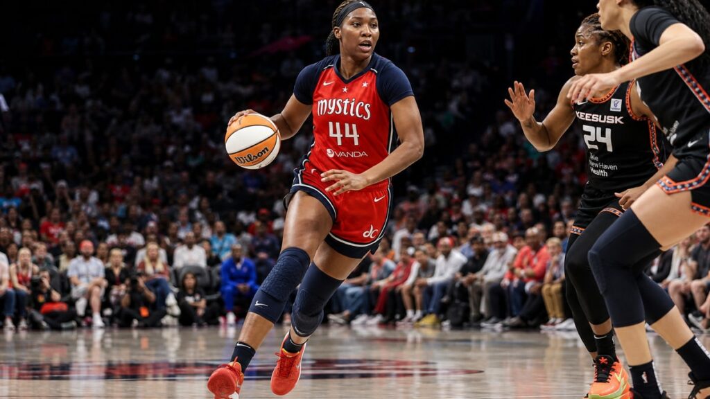 Kiki Iriafen driving to the basket for the Washington Mystics against the Las Vegas Aces