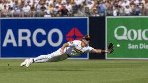 Jackson Merrill making a diving catch for the San Diego Padres