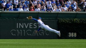 Pete Crow-Armstrong making a diving catch for the Chicago Cubs at Wrigley Field