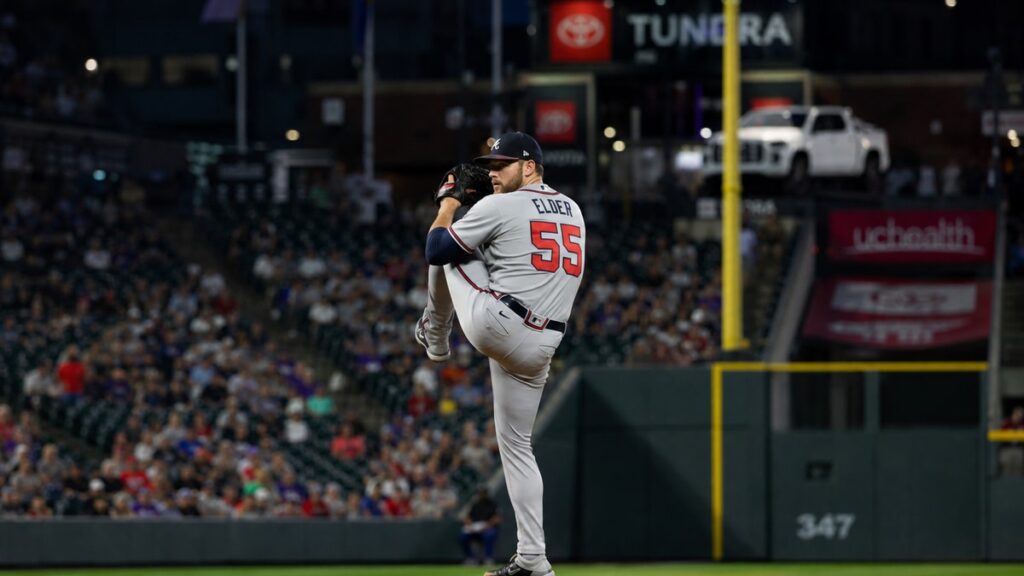 Bryce Elder in mid-windup pitching delivery for the Atlanta Braves