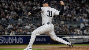 Cam Schlittler in mid-windup pitching motion for the New York Yankees