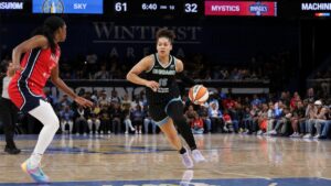 Sydney Taylor driving to the basket for the Chicago Sky against the Golden State Valkyries