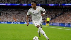 Vinicius Junior dribbling for Real Madrid amid Arsenal transfer speculation