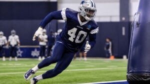 Von Miller pass rushing in a Dallas Cowboys jersey