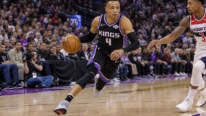 Russell Westbrook driving to the basket for the Sacramento Kings