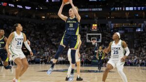 Jessica Shepard grabbing a rebound for the Dallas Wings