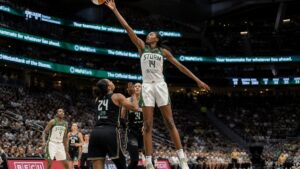 Dominique Malonga battling for a rebound for the Seattle Storm against the Las Vegas Aces