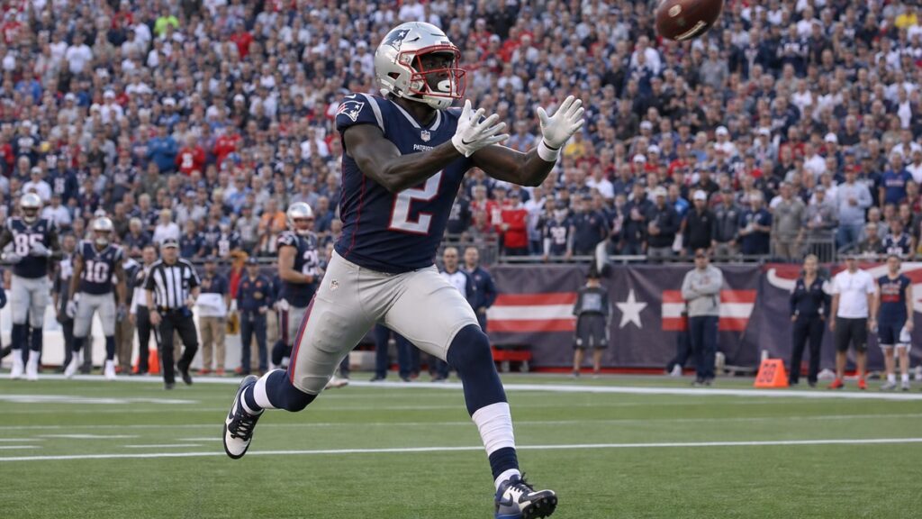 A.J. Brown running a route in a New England Patriots uniform