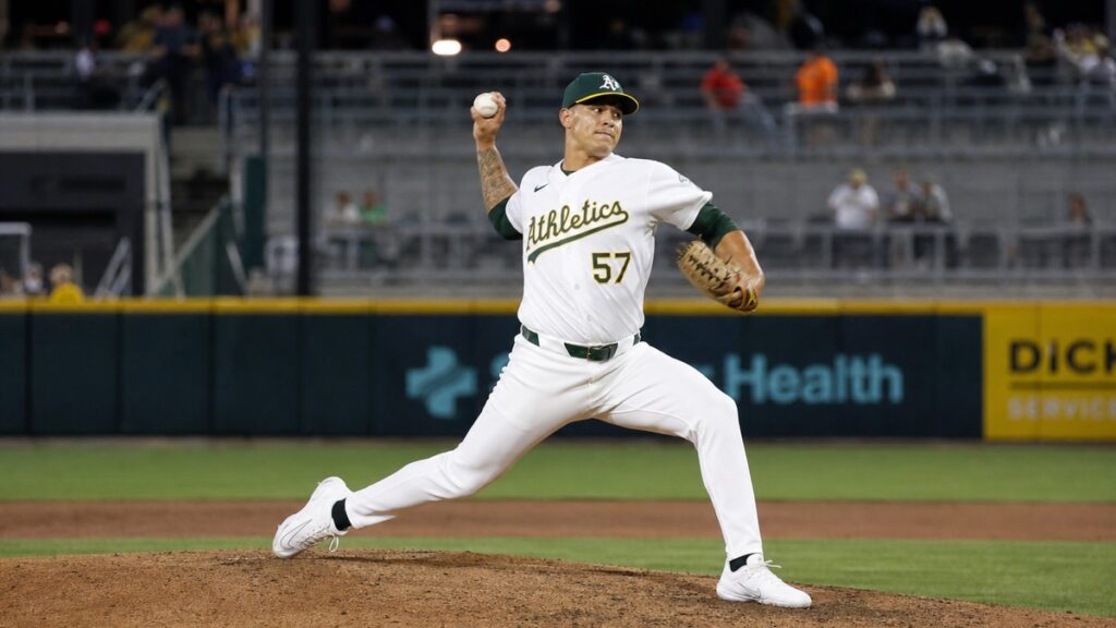 Jacob Lopez pitching for the Athletics against the Toronto Blue Jays at Sutter Health Park