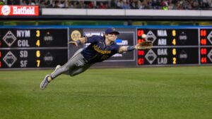 Sal Frelick of the Milwaukee Brewers making a diving catch in the outfield