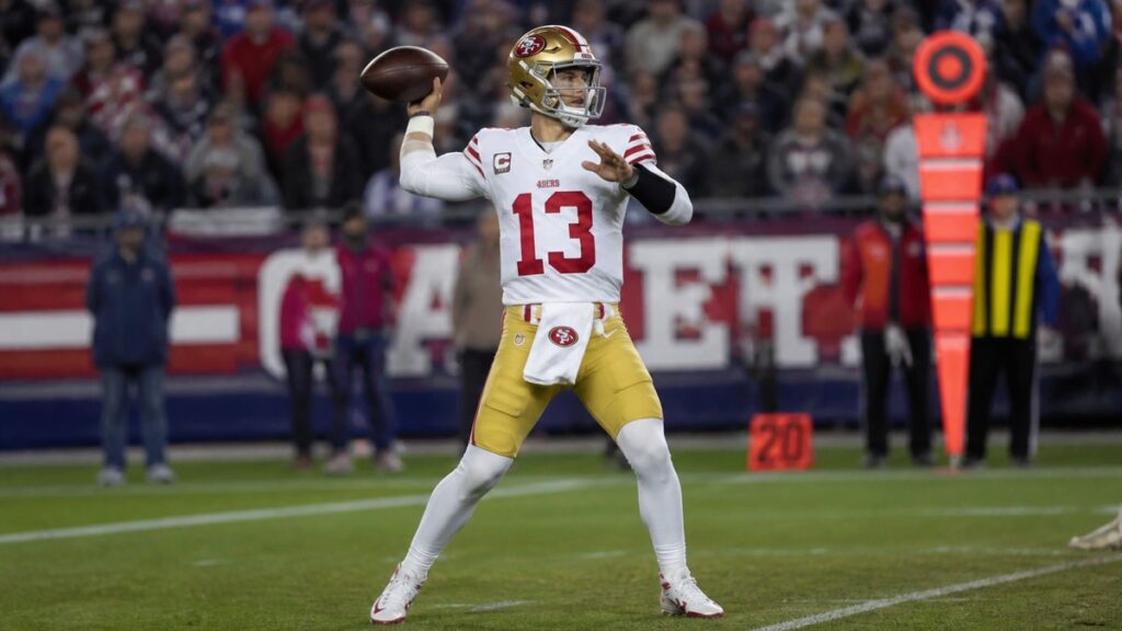 Brock Purdy throwing a pass for the San Francisco 49ers against the Los Angeles Rams