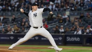Cam Schlittler pitching for the New York Yankees against the Mets at Yankee Stadium