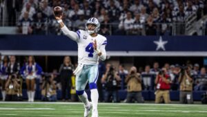 Dak Prescott throwing a pass for the Dallas Cowboys