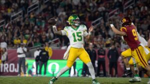 Oregon quarterback Dylan Raiola throwing a pass in relief during the Ducks win over USC