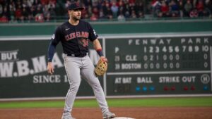 Nathaniel Lowe fielding first base for the Cleveland Guardians against the Boston Red Sox