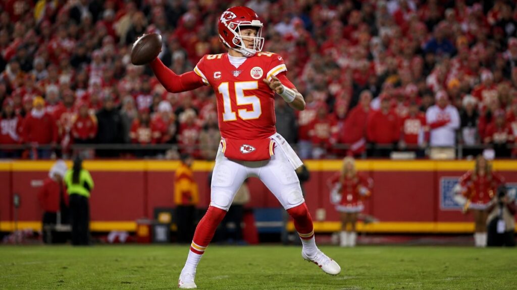 Patrick Mahomes throwing a pass for the Kansas City Chiefs at Arrowhead Stadium