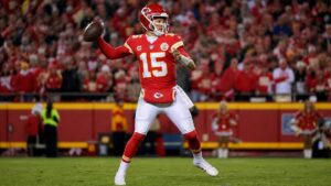 Patrick Mahomes throwing a pass for the Kansas City Chiefs at Arrowhead Stadium