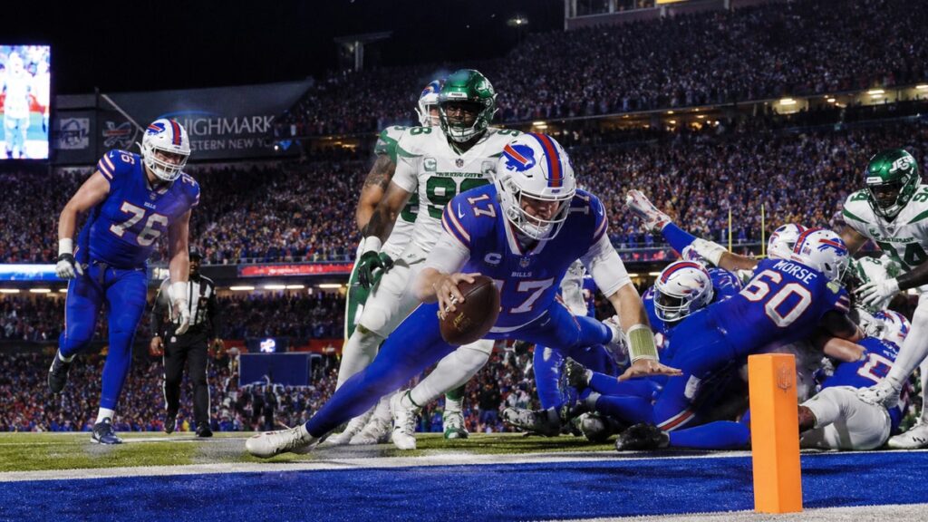 Josh Allen scoring a touchdown for the Buffalo Bills against the Detroit Lions