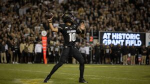 Julian Lewis throwing a pass for the Colorado Buffaloes against Georgia Tech